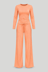 Conjunto Feminino SHIRA de manga longa em cor laranja vibrante para momentos estilosos