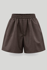 Short HONEY pour femme en couleur marron avec taille élastique, confectionné en polyester et élasthanne, tailles XS/S–M